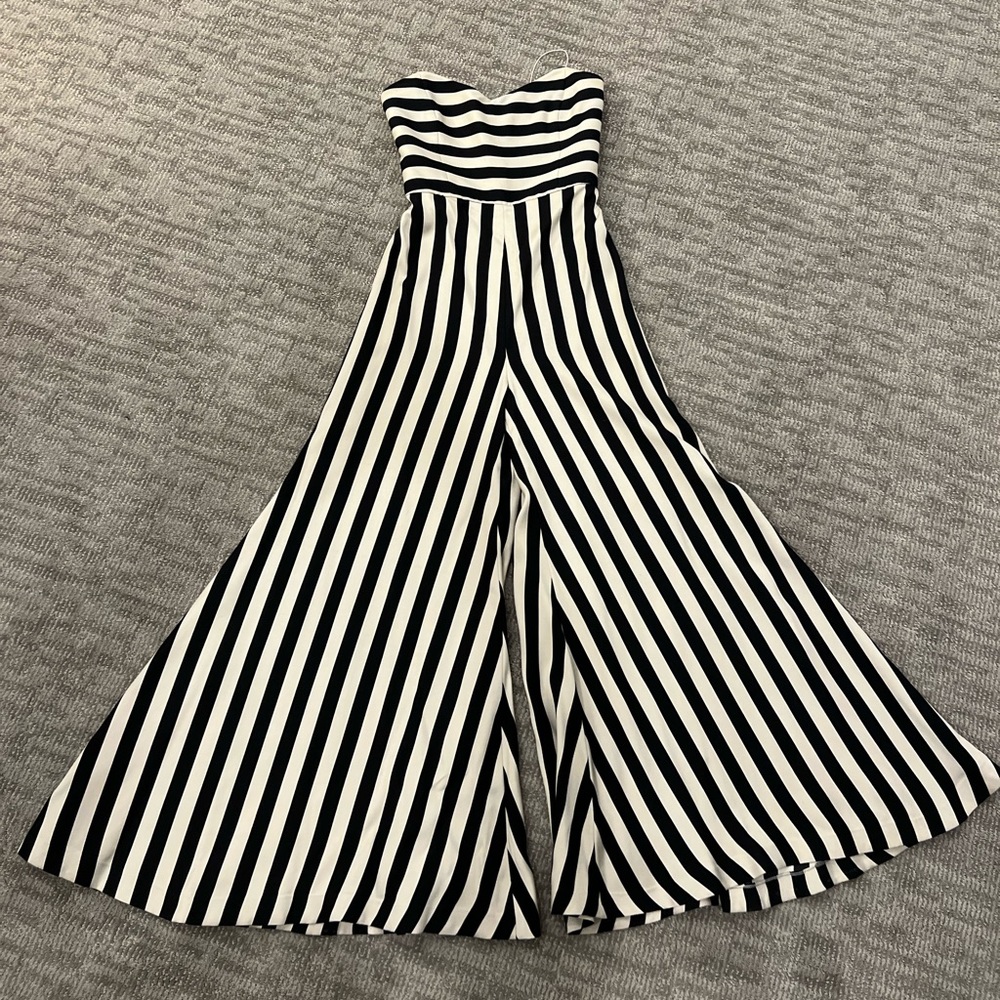 Caroline contas jumpsuit. It’s a size 6 but I tailored it. It fits like a 2-4